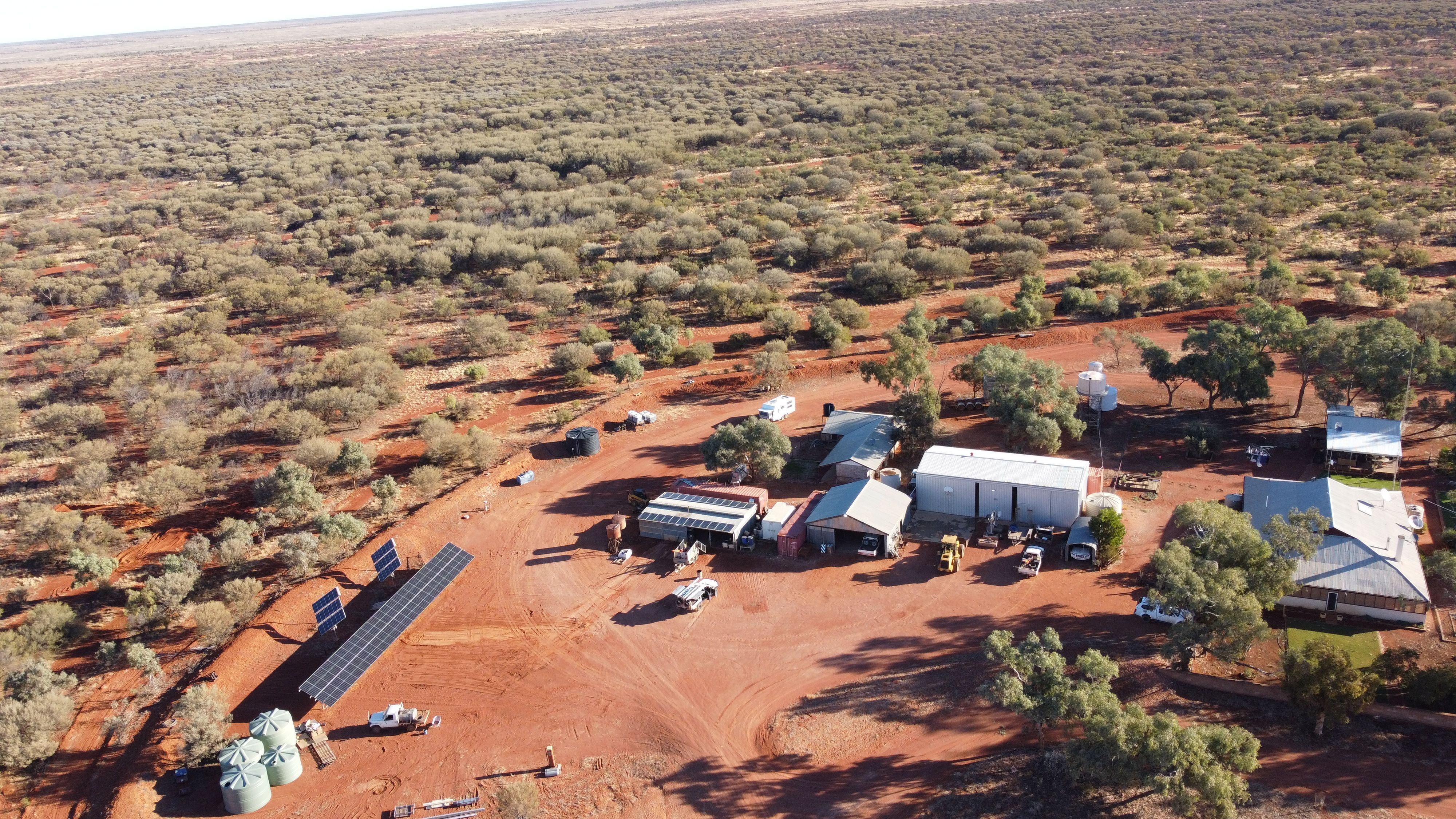 remote area power - off grid power system at an outback station aerial drone view