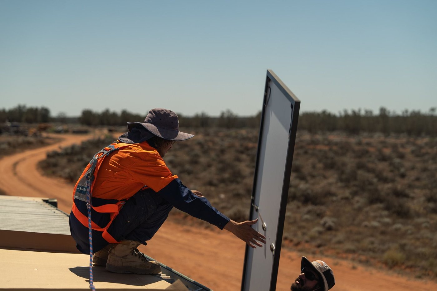 MyEnergy team installing solar panels