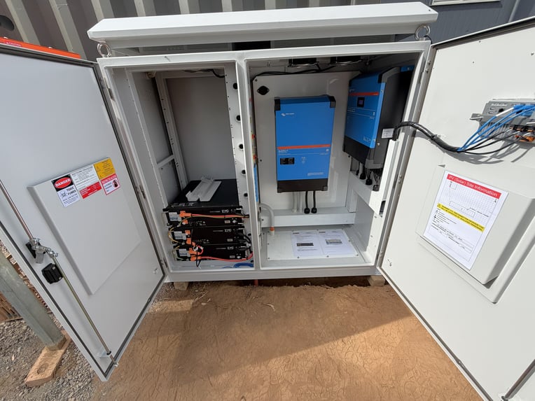 Off-grid power equipment in a protective cabinet at the Barmah tiny-home installation